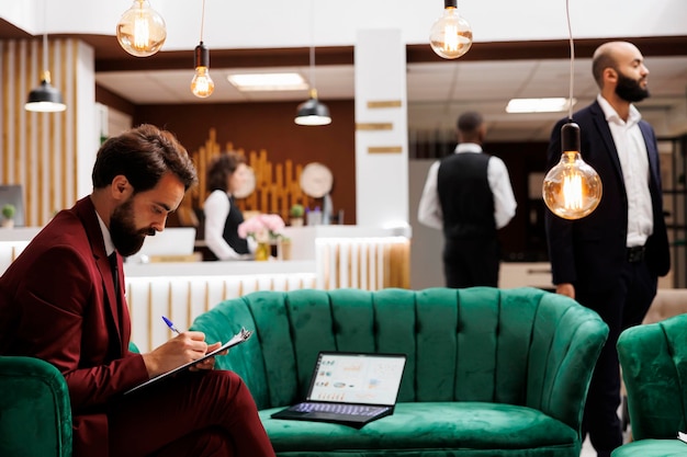 Entrepreneur taking notes on files