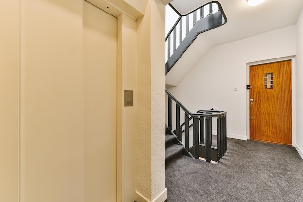 The entryway of a house with a wooden door