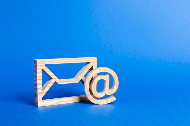 Envelope and email symbol on a blue background Concept email address Internet technologies and contacts for communication Communication over the network business and correspondence