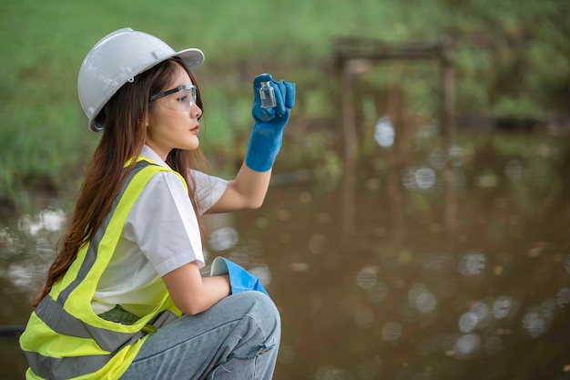 Environmental engineers inspect water qualityBring water to the lab for testingCheck the mineral content in water and soilCheck for contaminants in water sources