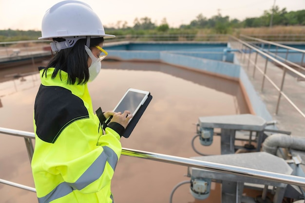 Environmental engineers work at wastewater treatment plantsWater supply engineering working at Water recycling plant for reuse