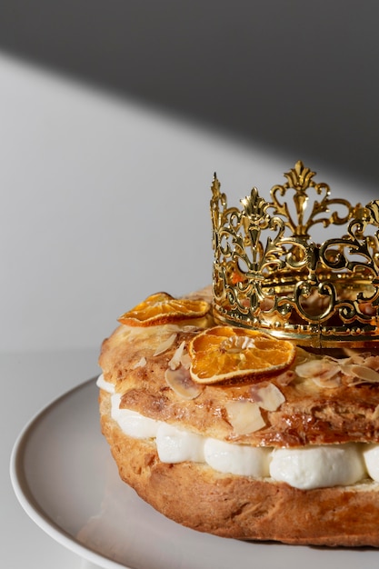 Epiphany day dessert with crown and copy space