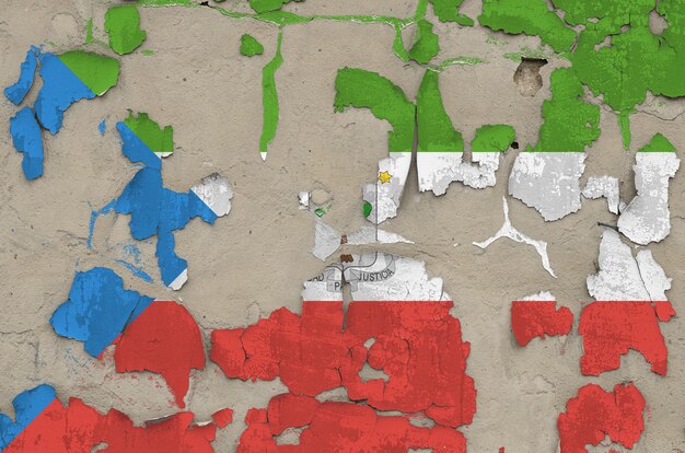 Equatorial Guinea flag depicted in paint colors on old obsolete messy concrete wall closeup background