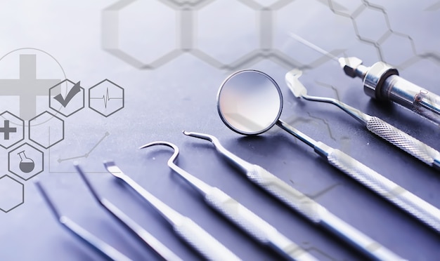 Equipment for the dental office. Orthopedic Instruments. Dental technician with working tools. Dentist metal tools.