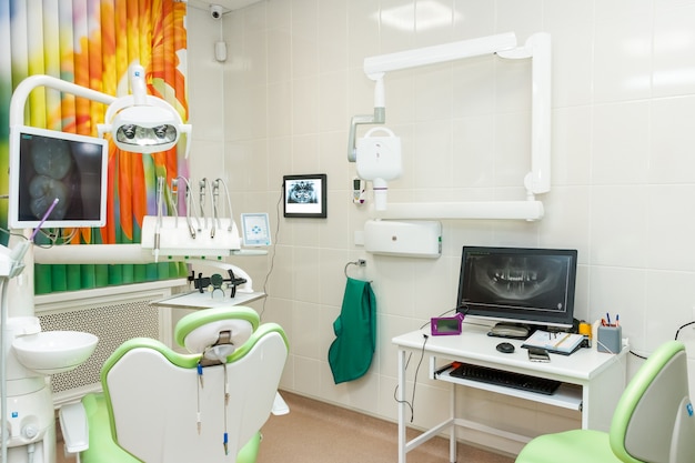 equipment for a dentist, dentist office.Design of new modern dental clinic office with new dental treatment unit. medical instruments,