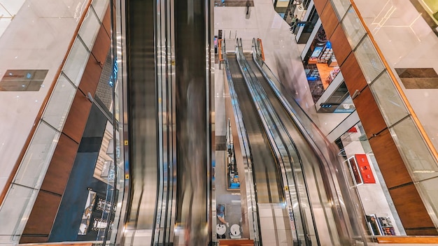 Escalators in a mall with a sign that says'escalators '