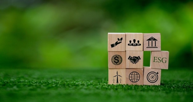 ESG concept of environmental social and governance words ESG on a wood cube is an idea for business sustainable organizational development account the environment society and corporate governance