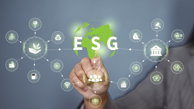 ESG icon concept in the hand for environmental, social, and governance in sustainable and ethical