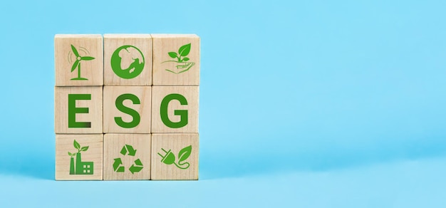 Esg words on a wood cubes esg concept of environmental social and governance wooden cube with