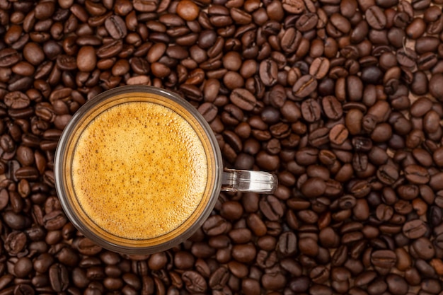 Espresso and coffee beans on the table