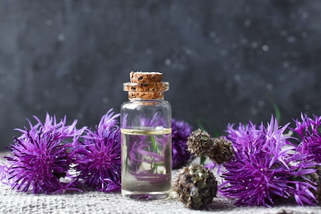 Essential oils and herbs with copy space