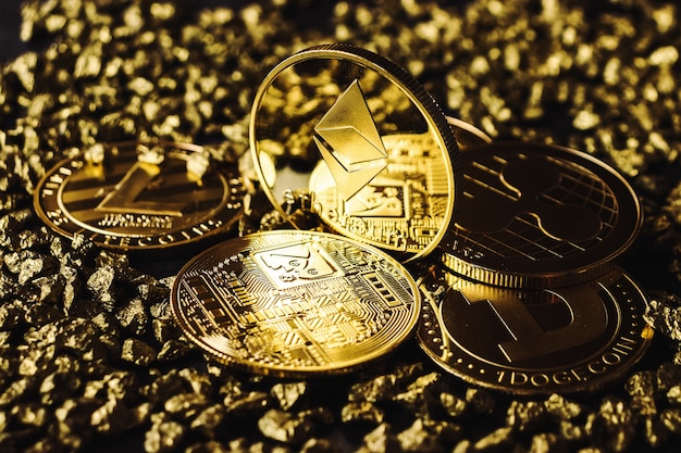 Ethereum cryptocurrency in close-up in the dark, pebbles of gold