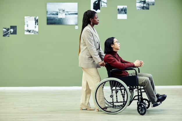 Ethnically Diverse Couple In Art Gallery