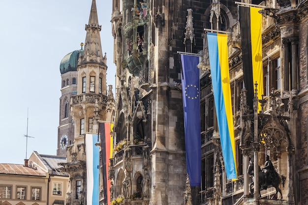 EU flag, Ukaraine Flag, Germany Flag Bavaria on Marienplatz in Munchen in Germany Support Ukraine