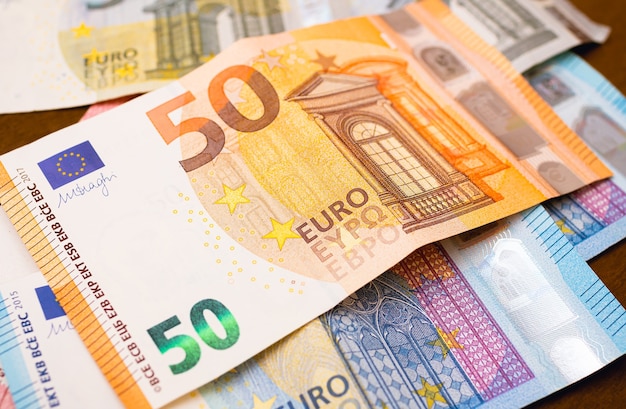 euro banknotes in closeup photography for economy and finance concept