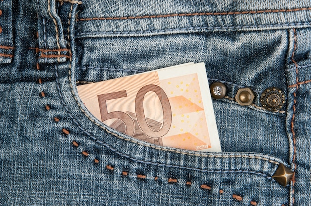 Euro bills in pocket 