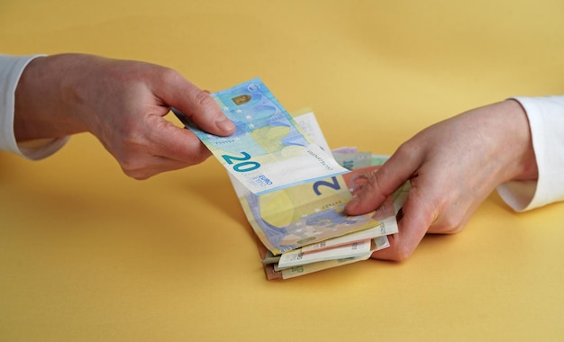 Euro Money Female hands holding euro banknotes