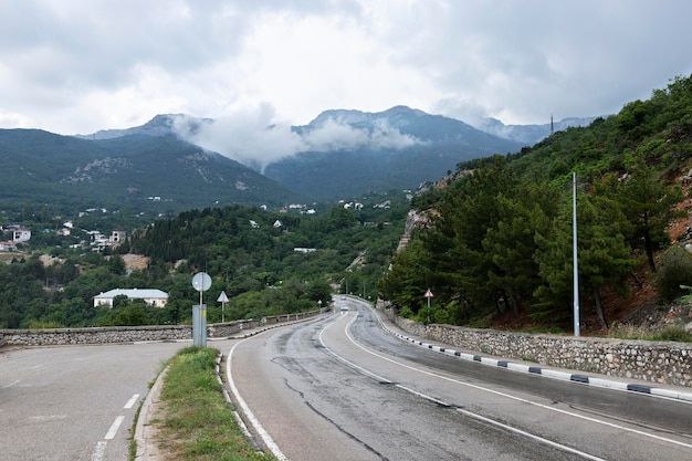 European Highway with markings in the mountains leading to the sea at dawn Coast of the Black Sea