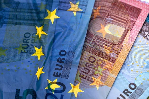 European union currency and flag of EU on surface business concept picture