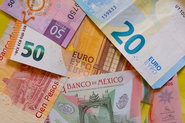 Euros and mexican pesos background Europe Mexico foreign exchange