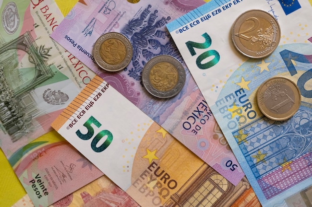 Euros and mexican pesos background Europe Mexico foreign exchange