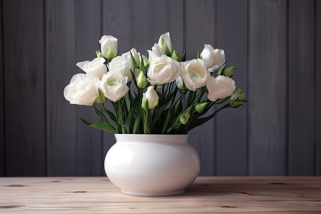 Eustoma in a white vase on a wooden table