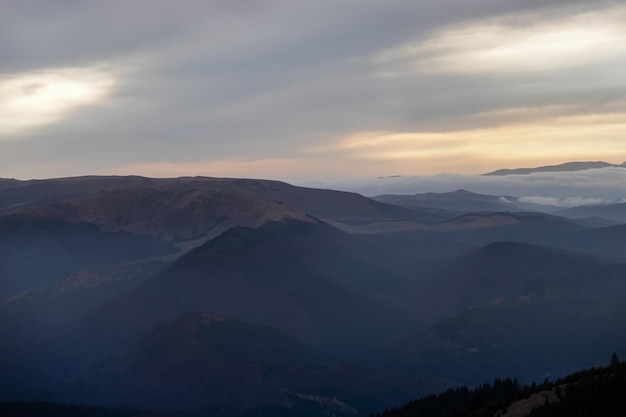 Evening landscape with Mountain peaks and valleys Ciucas mountains in Romania