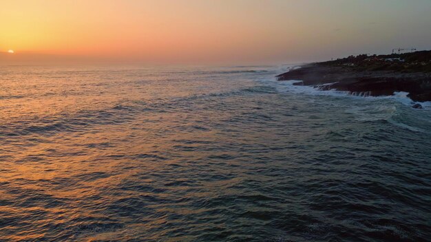 Evening ocean waves seascape aerial view marine coast washed by foamy water