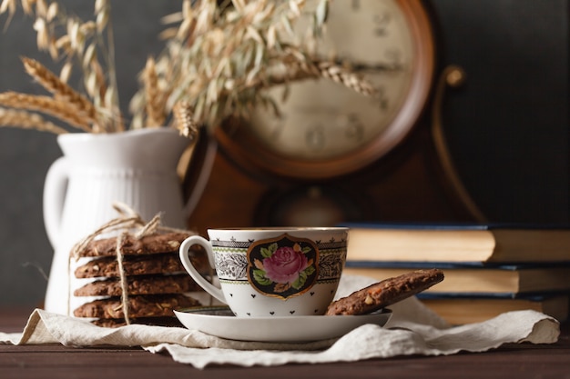 evening relax tea drinking with book. Concept