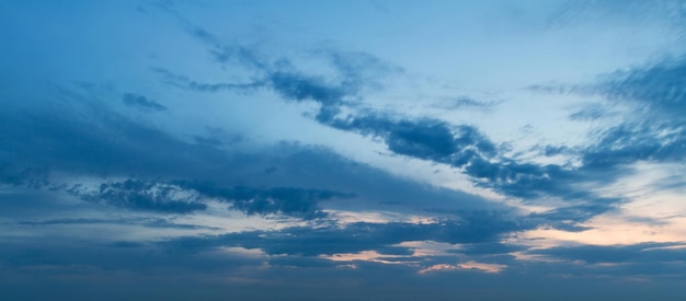 Evening sky. A blue night sky with clouds.