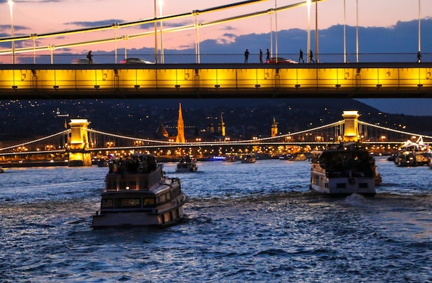 evening view of the Danube river, bridges, sights of Budapest. Hungary.