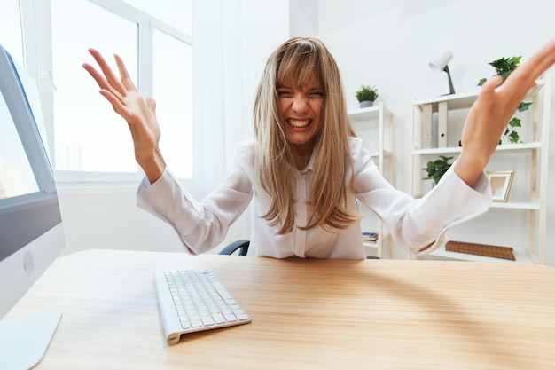 Evil irritated screaming adorable blonde businesswoman worker freelancer made critical mistake in report documents spread hands at camera in light modern office Copy space wide angle