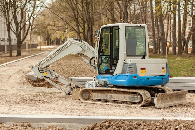 Excavator constructs road Road works with mini excavator Road construction Highway construction