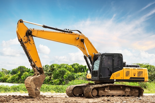 Excavator on ground in a summer day