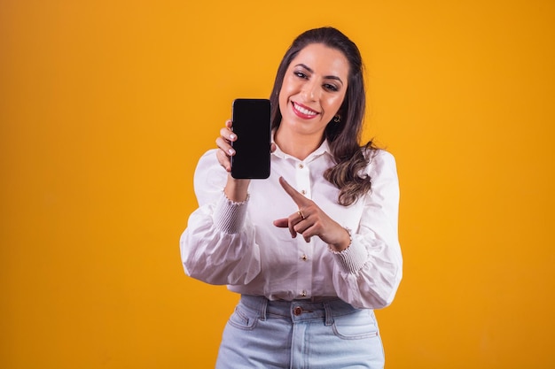 Excellent mobile offer. Woman with smartphone in her hand showing blank screen with space for text.