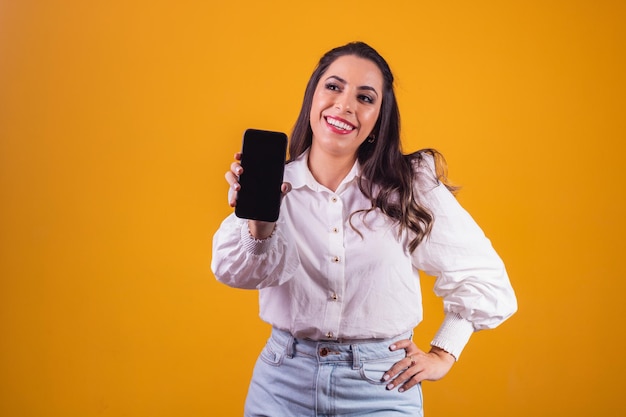 Excellent mobile offer. Woman with smartphone in her hand showing blank screen with space for text.