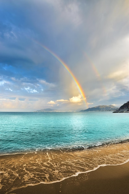 Exceptional rainbow over the sea creates a magical atmosphere