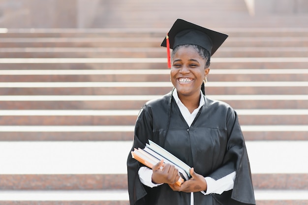 Excited African American woman at her graduation.