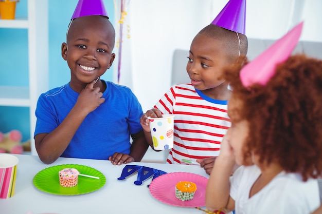 Excited kids enjoying a birthday party