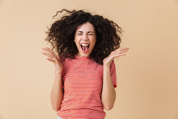 Excited screaming young woman