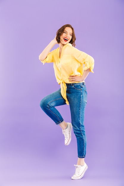 Excited woman posing isolated