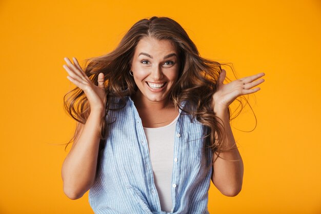 Excited young woman, celebrating success