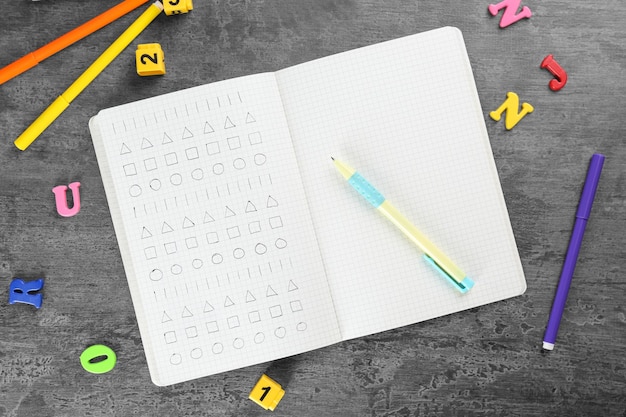 Exercise book with homework on table