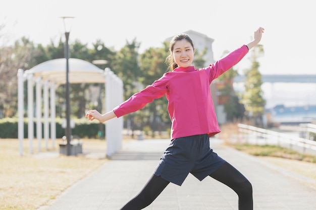 Exercising asian woman