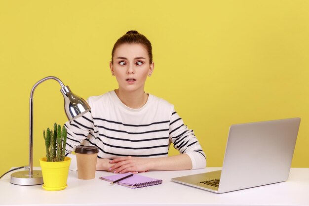 Exhausted funny woman fooling around crossing eyes pretending to be dumb and crazy