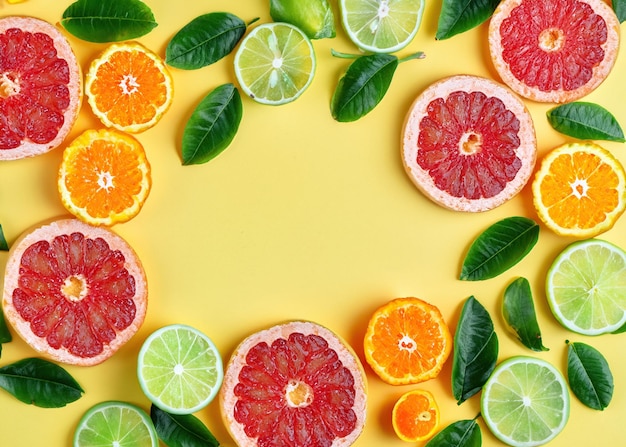 Exotic Citrus Paradise Juicy Citrus Slices and Tropical Leaves Creating a Vibrant Fruit Arrangement on a Creative Background