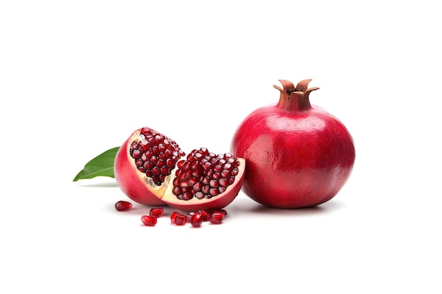 Exotic and delicious whole and part of pomegranate on white background