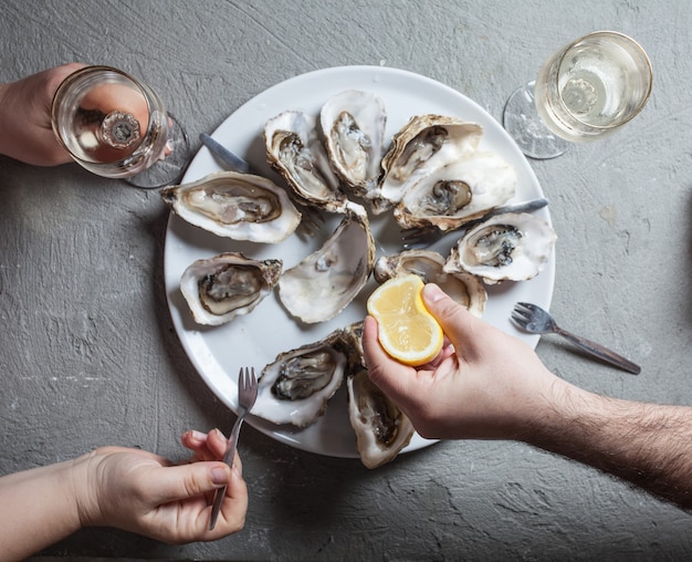 Exotic dish  oysters with wine