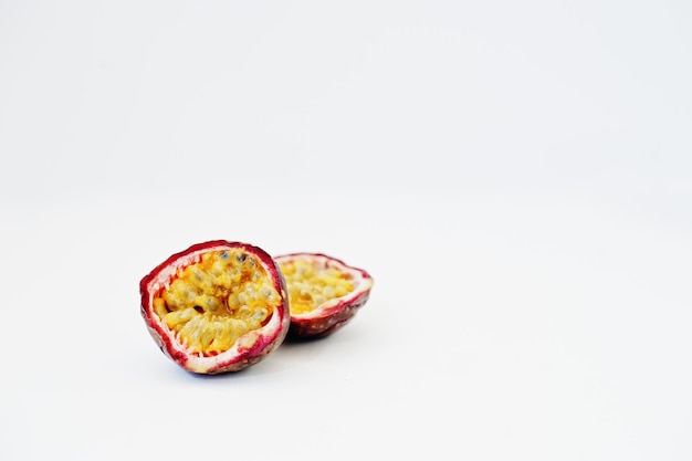 Exotic fruits passion fruit or maracuya Passiflora edulis isolated on white background Healthy eating dieting food