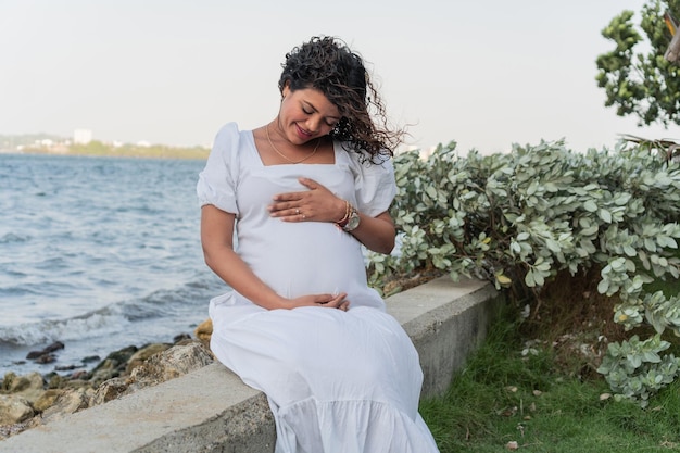 Expectant Mother39s Blissful Moment by the Sea